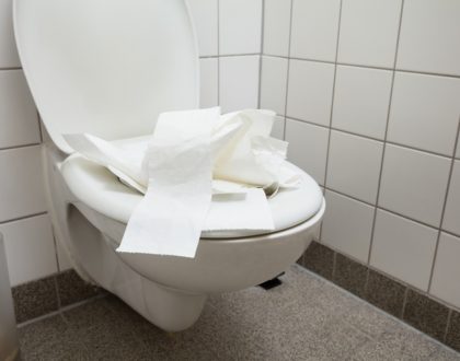 How to Unblock a Toilet Clogged with Paper