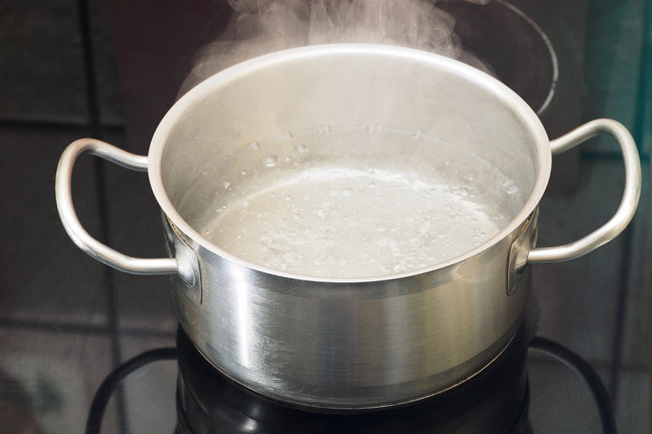 Pour boiling water down the sink