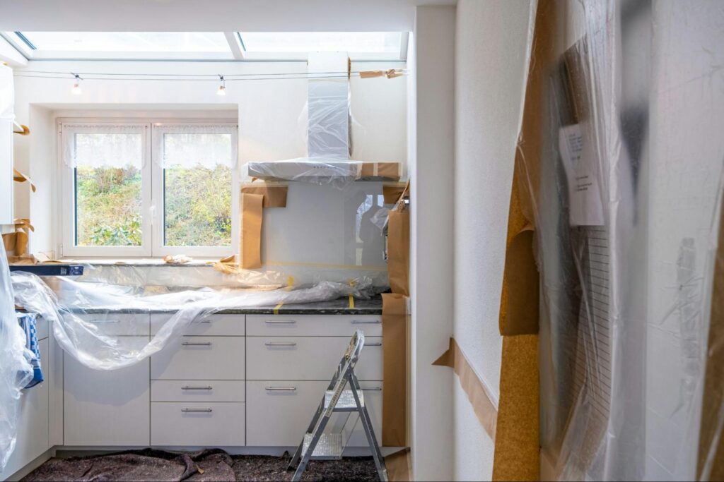 A bright, modern kitchen under renovation.